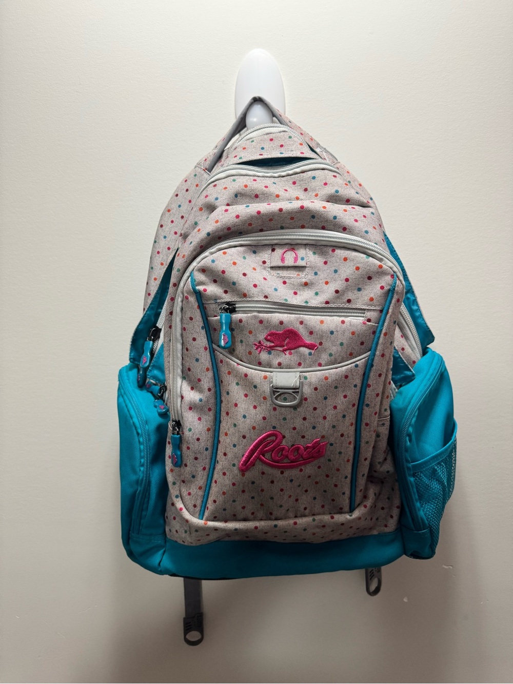 Roots Gray Polka Dot Backpack with Teal and Pink Accents